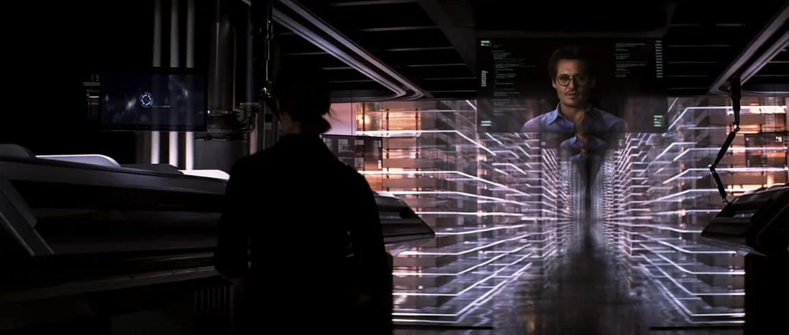 Transcendence (2014) movie still: medium — A dark, futuristic computer laboratory filled with glowing horizontal light strips and monitors. A woman…