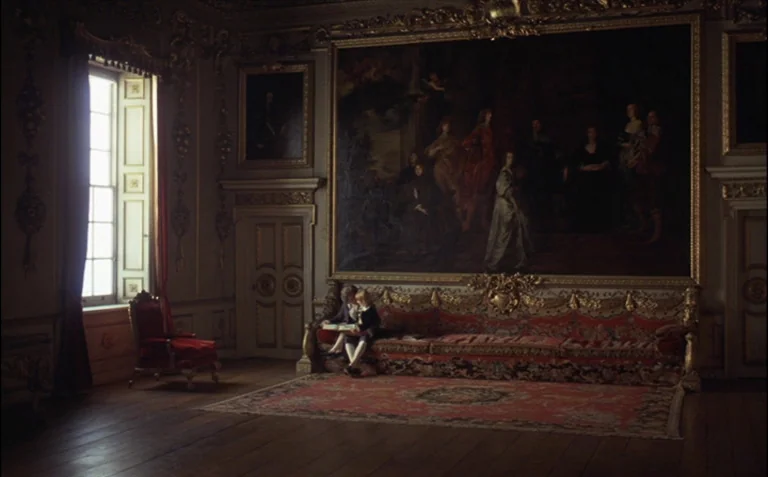 Barry Lyndon (1975) movie still: wide — An opulent, dimly lit room features dark wood flooring and a large antique oil painting. Two small children…