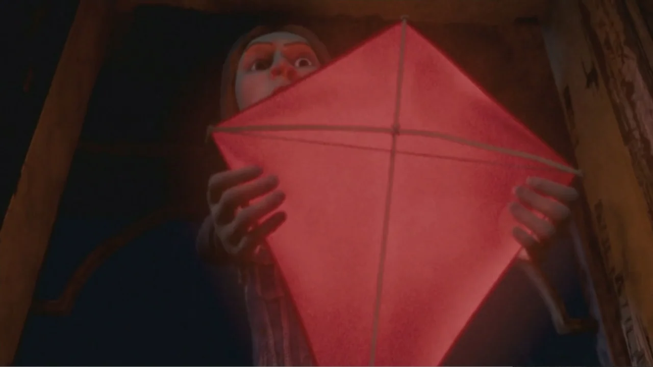 Monster House (2006) movie still: medium — An attic interior with dark wooden beams and shadows surrounding the subject. A young girl holds a bright…