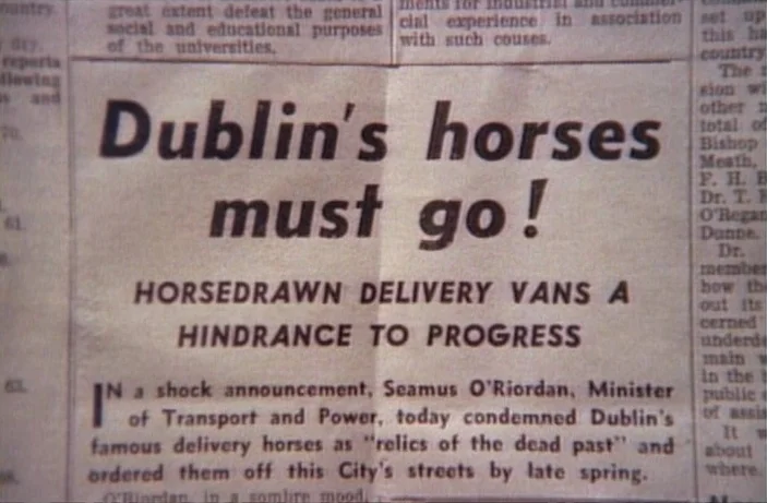 Quackser Fortune Has a Cousin in the Bronx (1970) movie still: closeup — A close-up view of a newspaper page featuring a bold headline about Dublin…