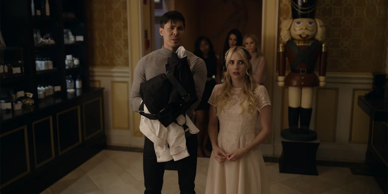About Fate (2022) movie still: medium — An upscale hotel lobby features ornate gold-patterned walls and a large wooden nutcracker statue. A man and…