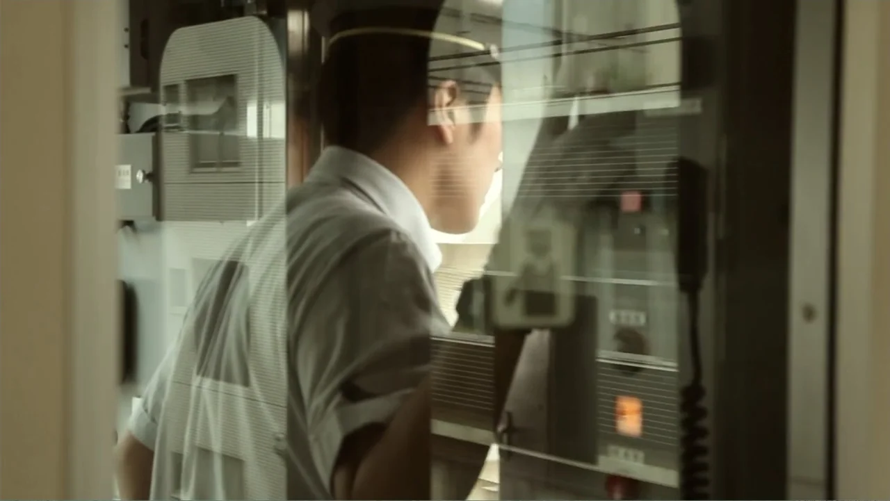 Flowers of Taipei: Taiwan New Cinema (2014) movie still: medium — The small compartment of a train features control panels and glass viewing…