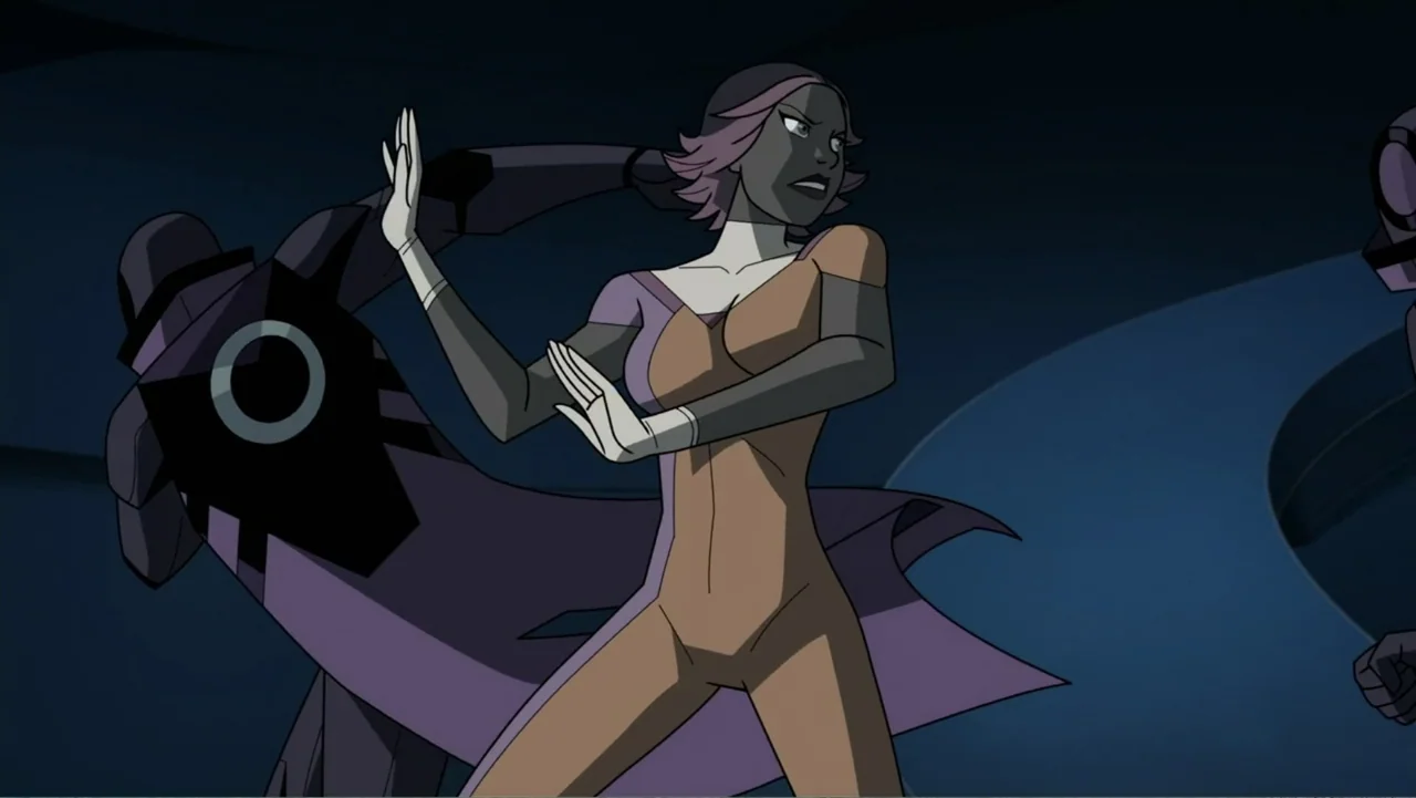 Legion of Super-Heroes (2023) movie still: medium — A dimly lit indoor corridor features curved architectural walls and a sleek modern aesthetic. A…