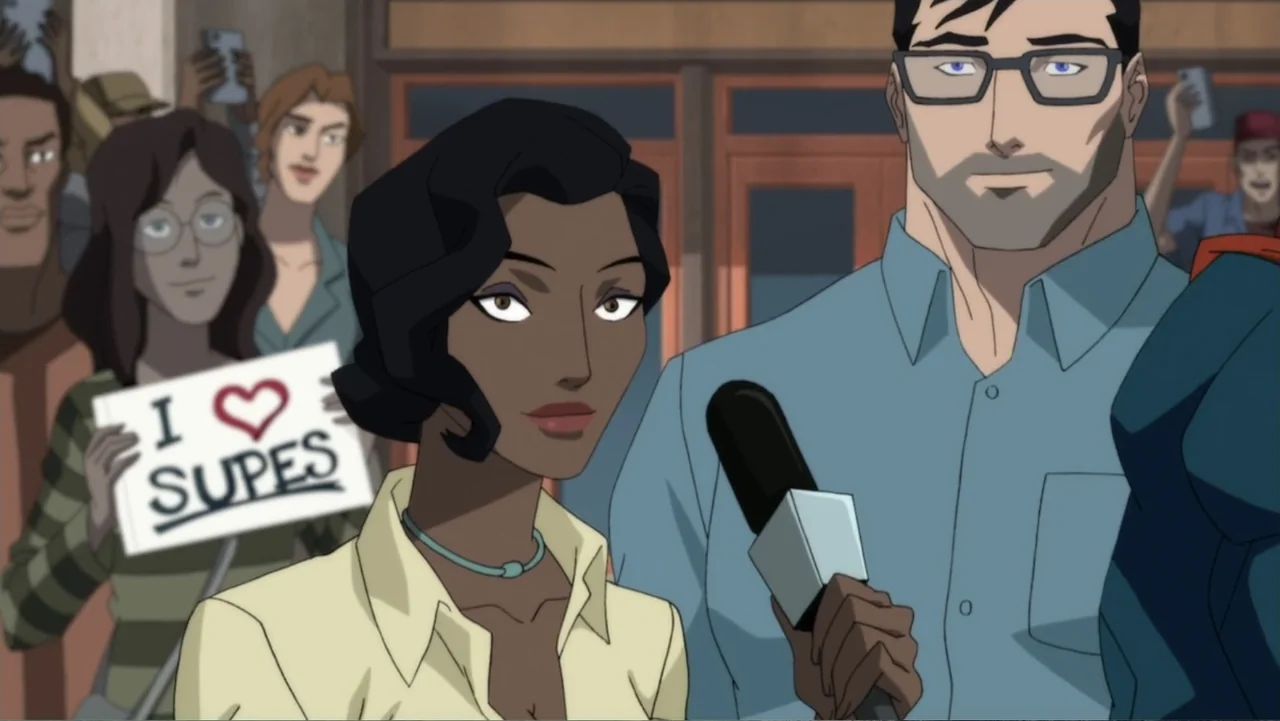 Reign of the Supermen (2019) movie still: medium — A crowd of people stands behind two individuals in a public outdoor space. A woman interviews a…