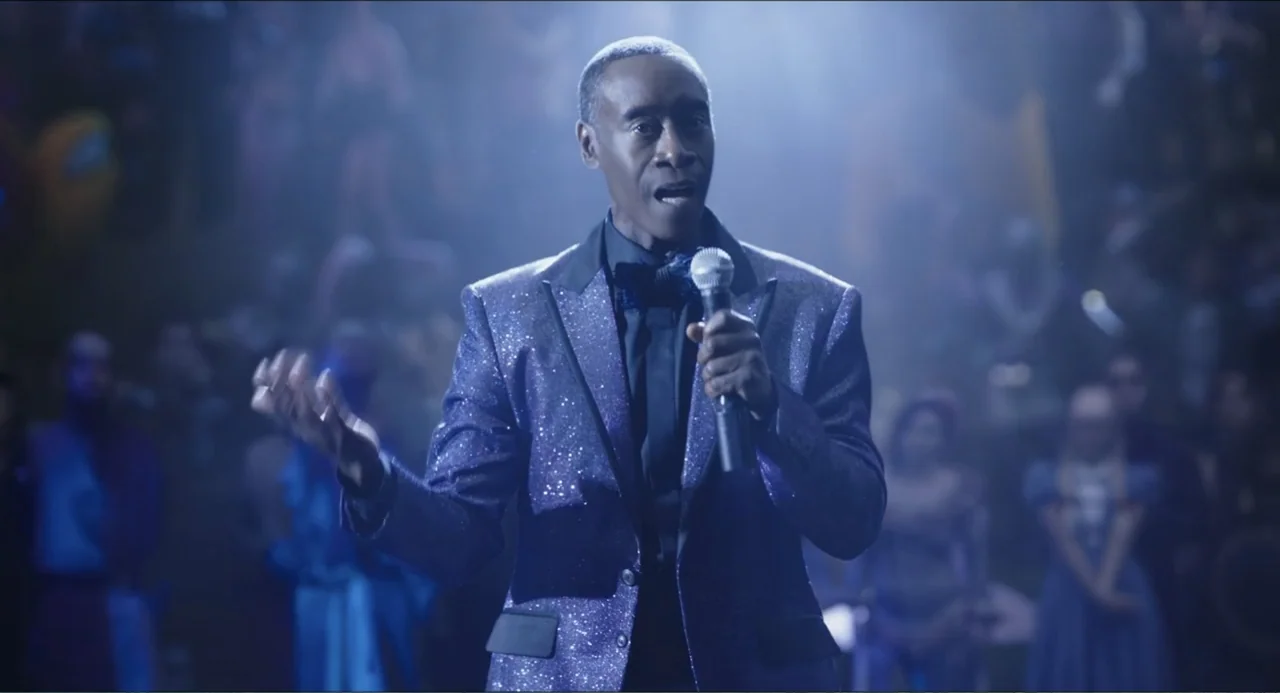 Space Jam: A New Legacy (2021) movie still: medium — An interior event hall filled with a crowd of people in the blurred background. A man wearing a…