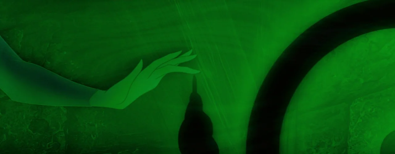 Sleeping Beauty (1959) movie still: closeup — A green stylized background with thin, radiating vertical lines across the surface. A disembodied hand…