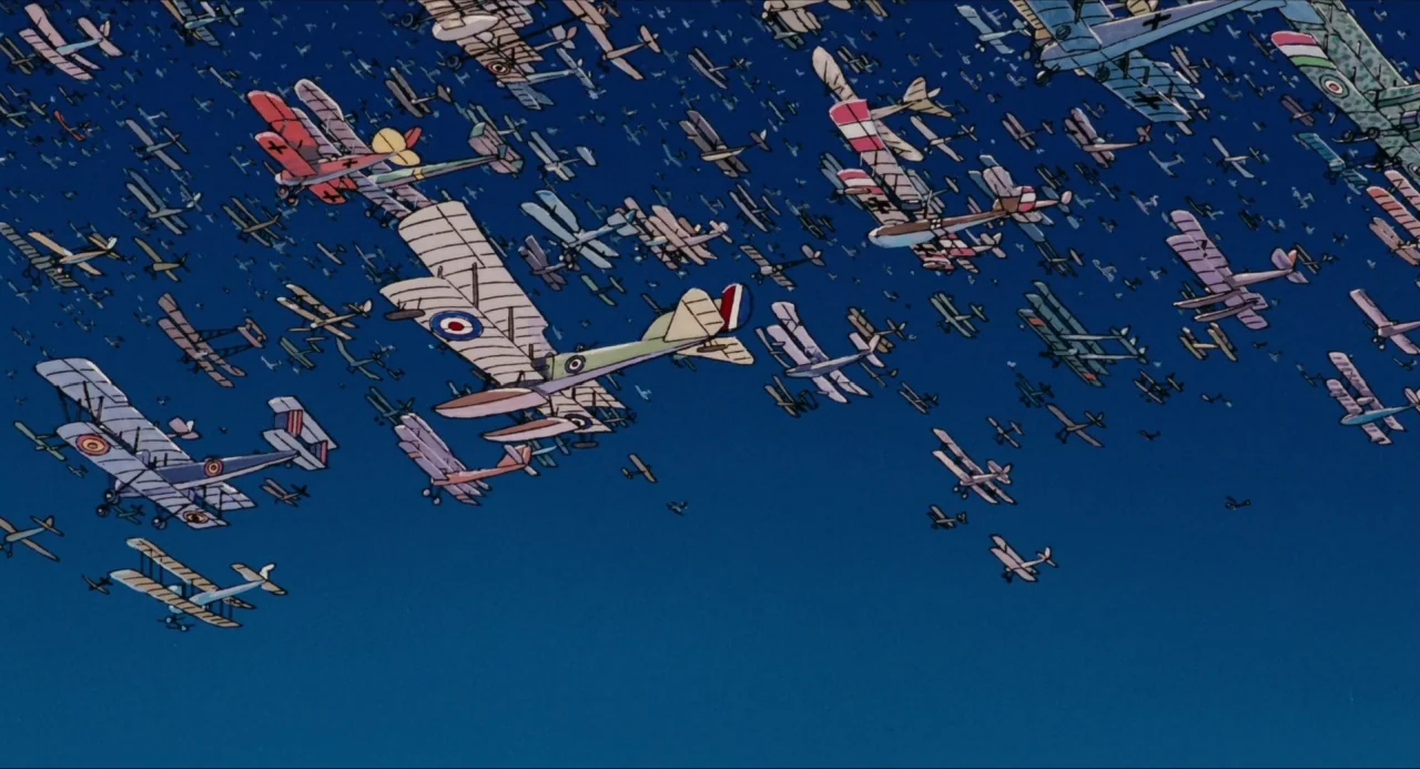 Porco Rosso (1992) movie still: wide — A vast swarm of vintage biplanes fills the upper portion of a clear sky. The aircraft are displayed in…