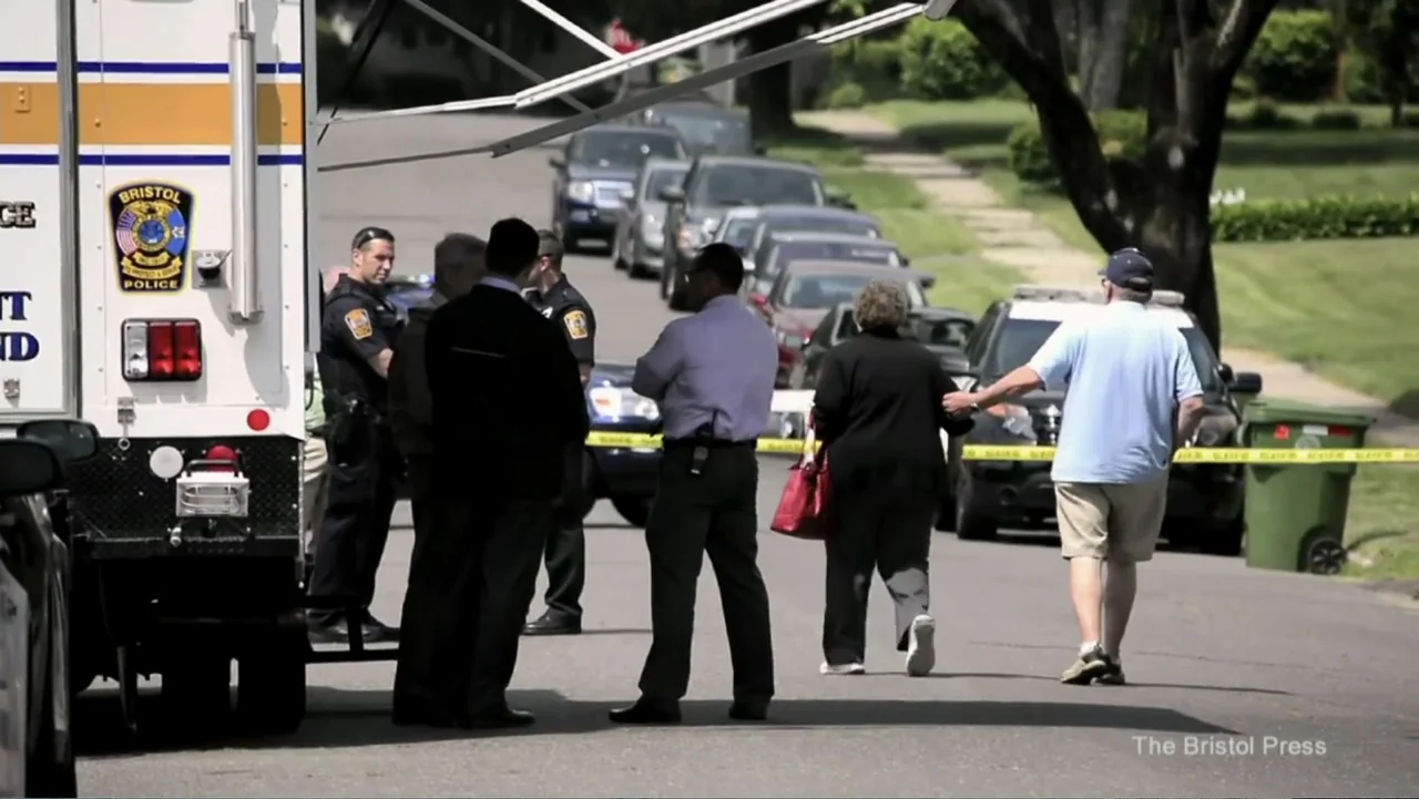 Requiem for the Dead: American Spring 2014 (2015) movie still: fullbody — A suburban residential street is cordoned off by yellow police tape during…