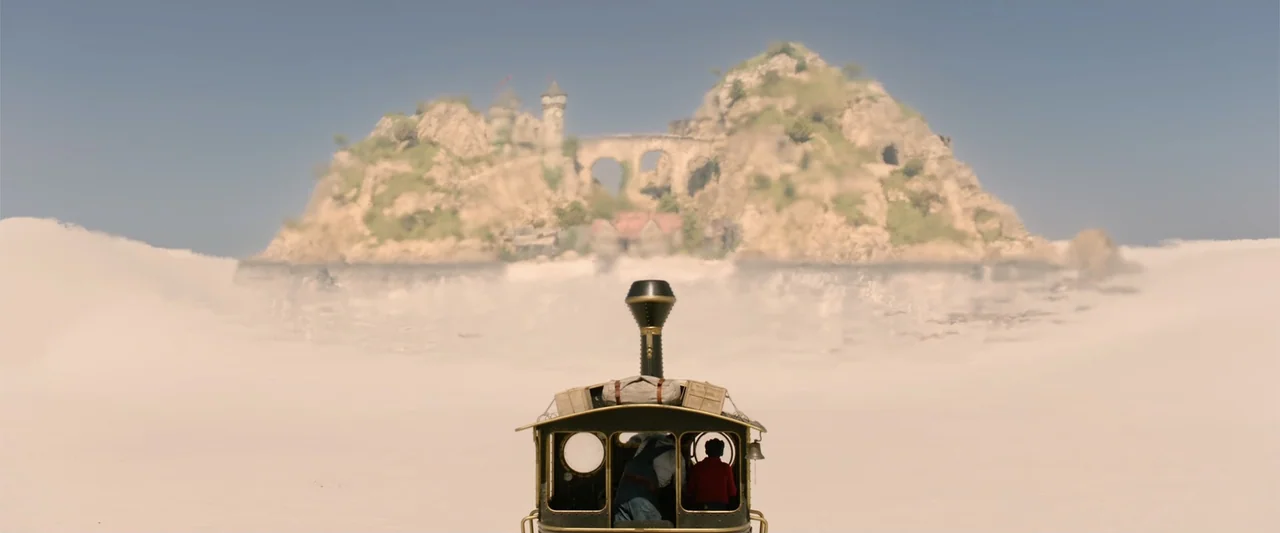 Jim Button and Luke the Engine Driver (2018) movie still: wide — A steam locomotive travels through a vast, featureless beige desert plain. A…