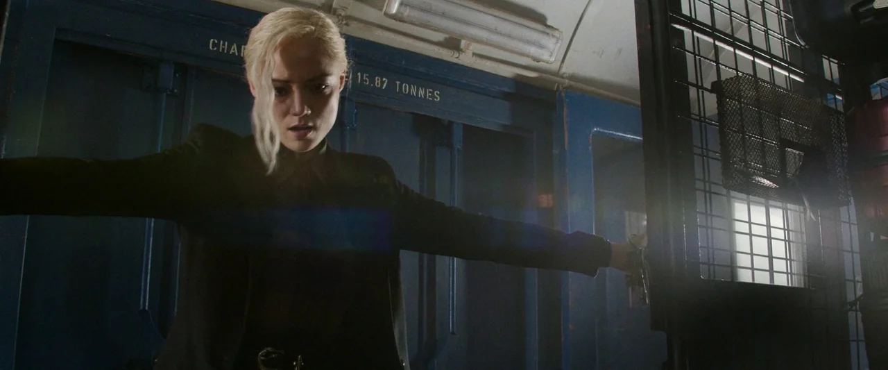 Mission: Impossible – Dead Reckoning Part One (2023) movie still: medium — A blue-walled train carriage with text indicating loading weight and a…