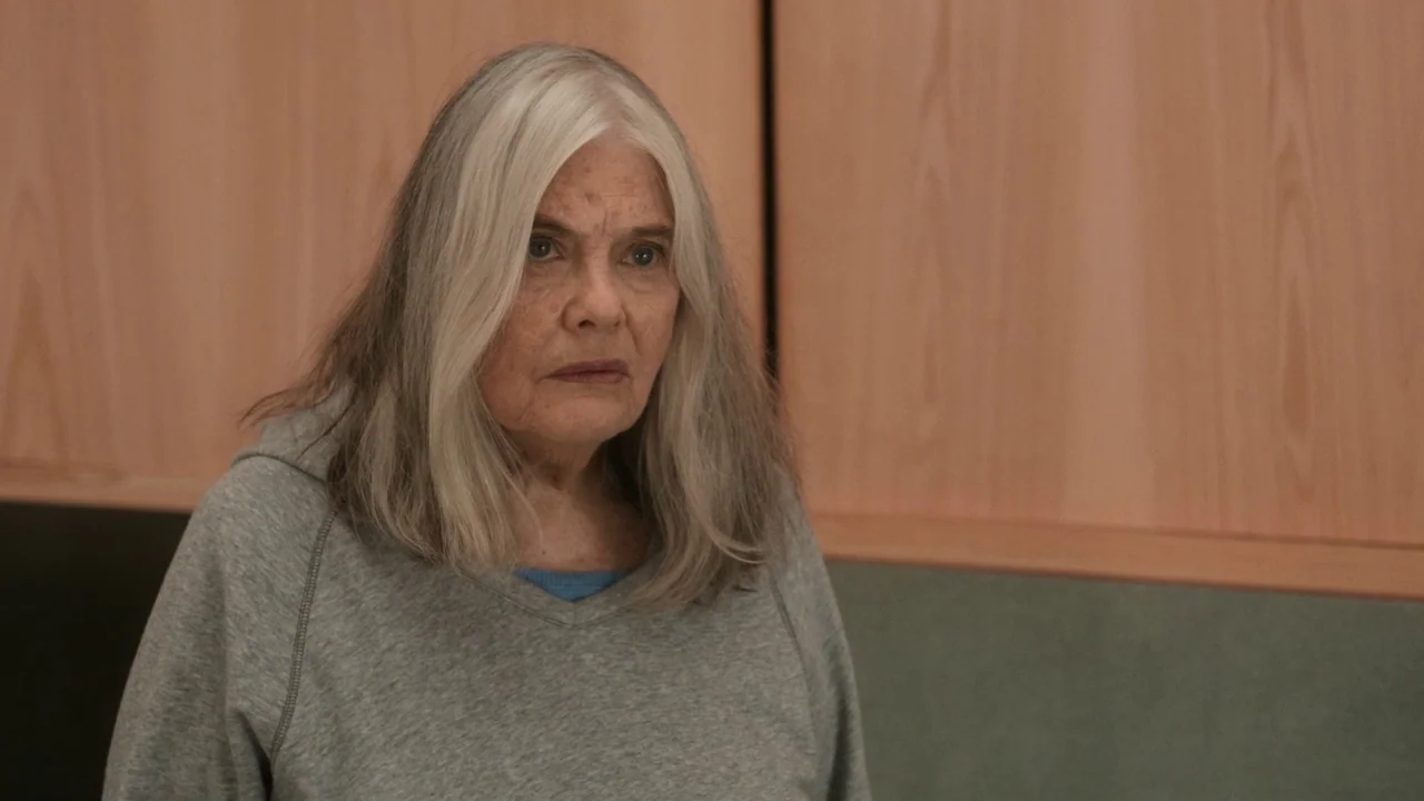 Marjorie Prime (2017) movie still: closeup — An interior space features wood paneled walls and a muted green lower wall section. An elderly woman…