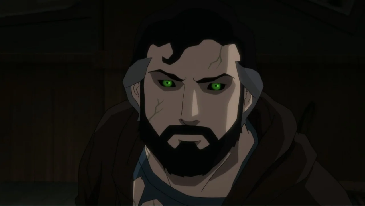 Justice League Dark: Apokolips War (2020) movie still: closeup — A dark indoor space with minimal architectural detail visible in the shadows. A man…