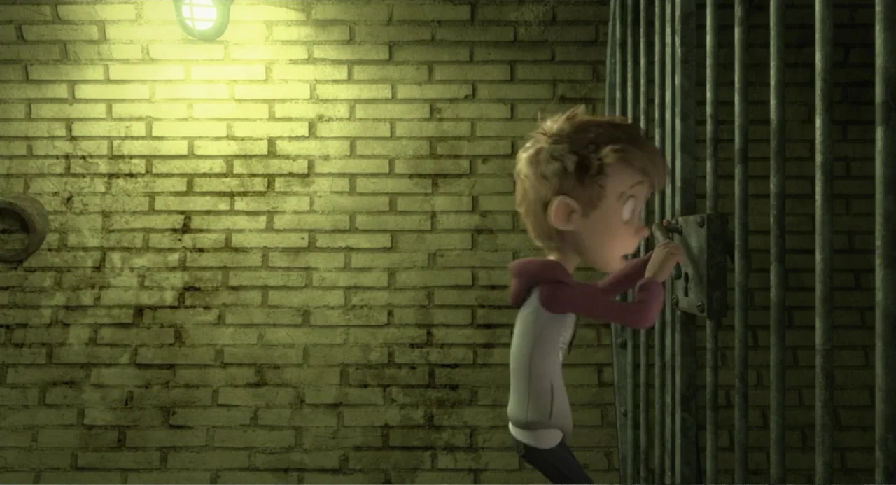 Luis and the Aliens (2018) movie still: medium — A stark room features a rough brick wall and vertical metal bars of a door. A young boy in a raglan…