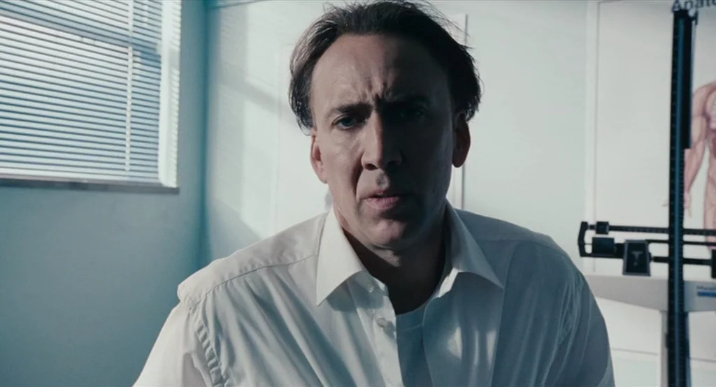 Bad Lieutenant: Port Of Call New Orleans (2009) movie still: medium — A stark medical examination room features white walls and a height scale…