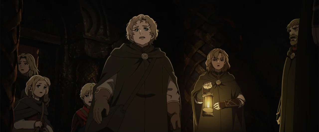The Lord of the Rings: The War of the Rohirrim (2024) movie still: medium — A group of travelers moves through a dimly lit stone passage with arched…