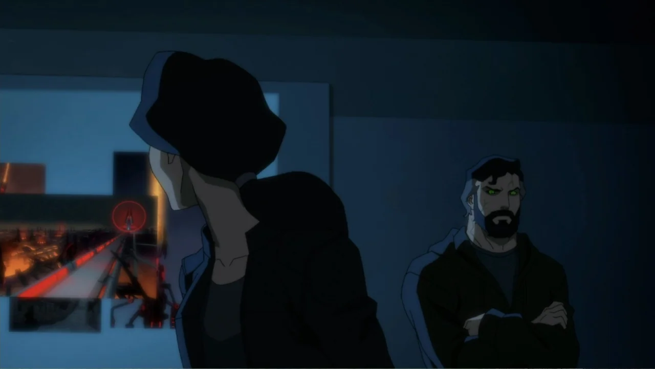 Justice League Dark: Apokolips War (2020) movie still: medium — A dark interior room features large computer screens displaying red graphical data…
