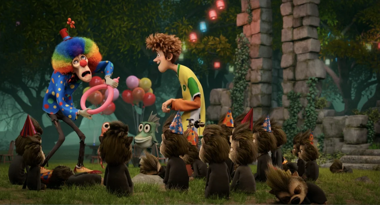 Hotel Transylvania 2 (2015) movie still: medium — A grassy clearing at night features stone ruins and glowing lanterns in the trees. A clown and a…
