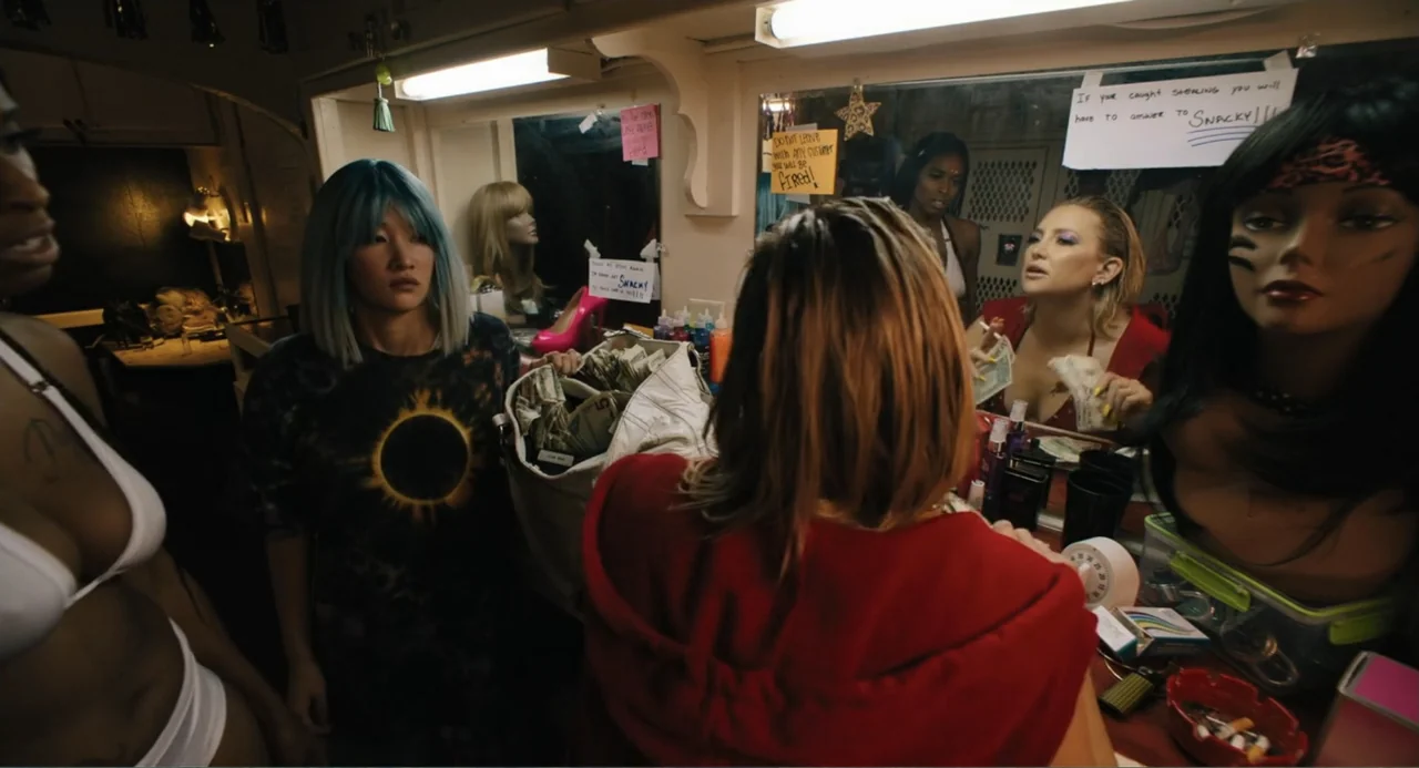 Mona Lisa and the Blood Moon (2022) movie still: medium — A cluttered dressing room featuring a vanity mirror surrounded by various notes and…