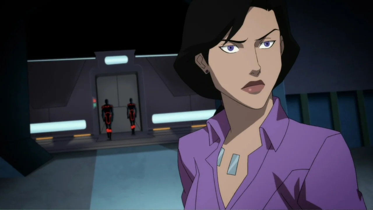 Reign of the Supermen (2019) movie still: medium — A dark, metallic futuristic interior features smooth walls and a glowing doorway at distance. A…