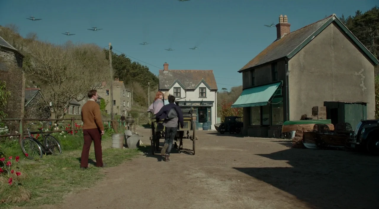 Miss Peregrine’s Home for Peculiar Children (2016) movie still: wide — A quiet rural English village setting with stone houses and a dirt road path.…