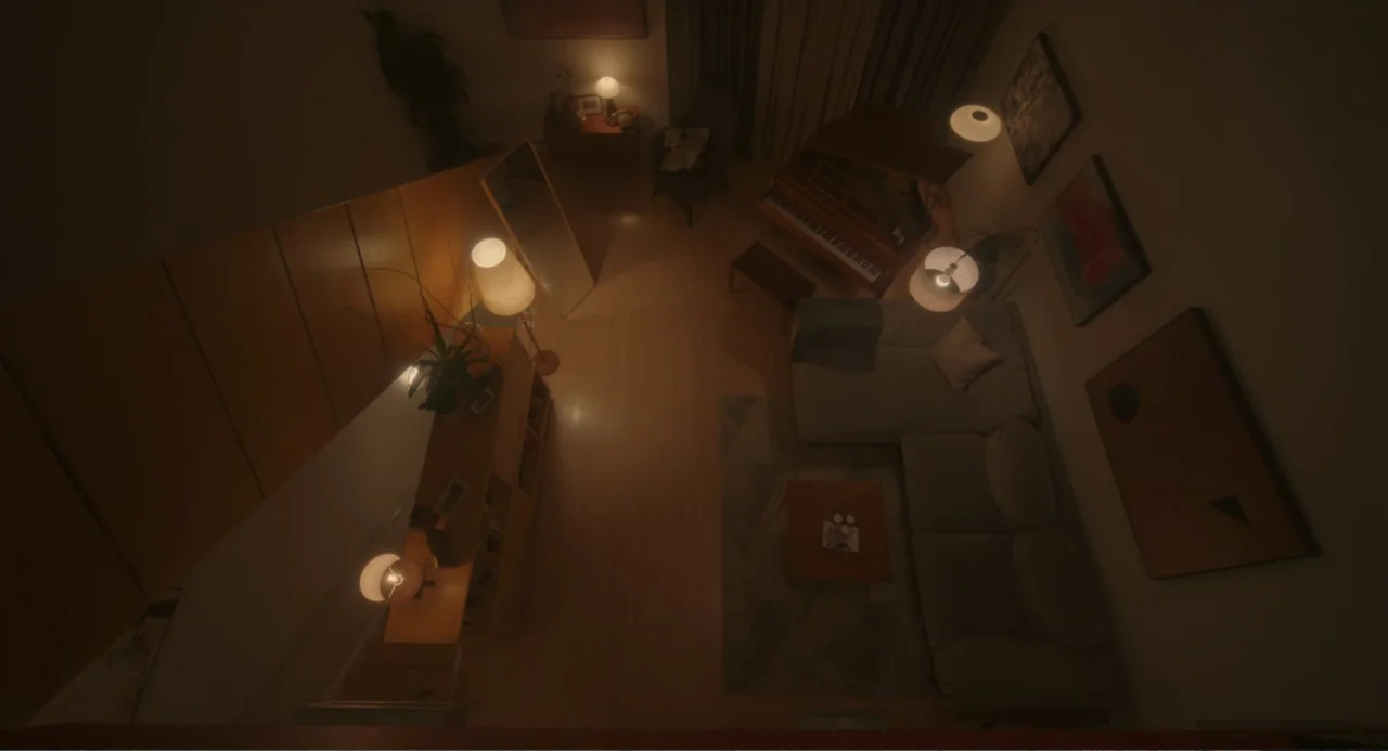 Orphan: First Kill (2022) movie still: establishing — A furnished living room viewed from a high overhead perspective in low light. The space…