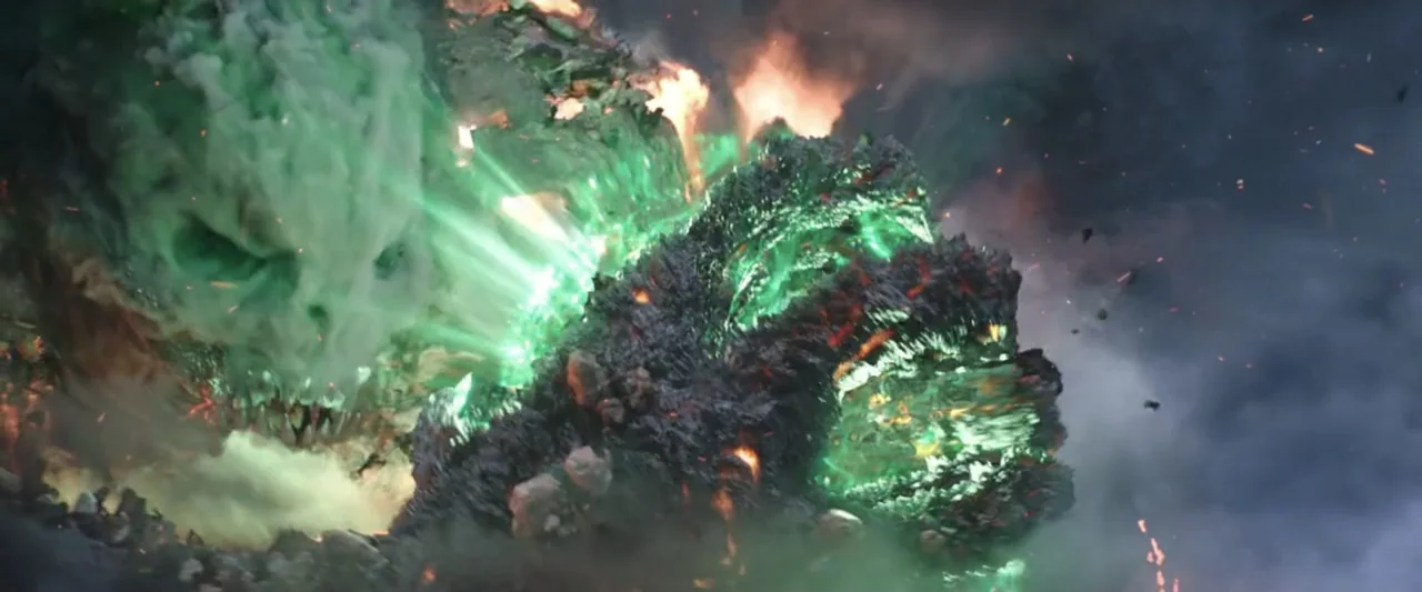 Spider-Man: Far From Home (2019) movie still: medium — A craggy creature composed of dark rock and glowing green light emerges from smoke. Molten…