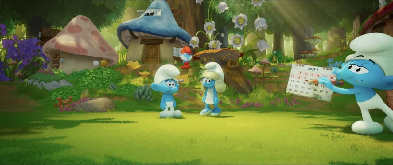 Smurfs (2025) movie still: medium — A green clearing filled with mushroom shaped houses and large white flowers. Three blue characters gather on the…