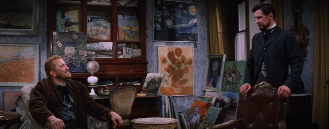 Lust For Life (1956) movie still: medium — An artist's studio cluttered with multiple paintings, including sunflowers and a self-portrait on the…