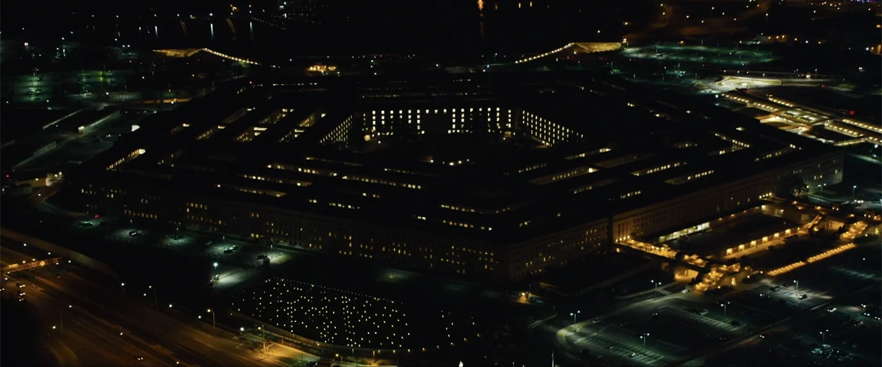 Battleship (2012) movie still: establishing — An aerial night view of the Pentagon building displays its distinctive five-sided geometric structure.…
