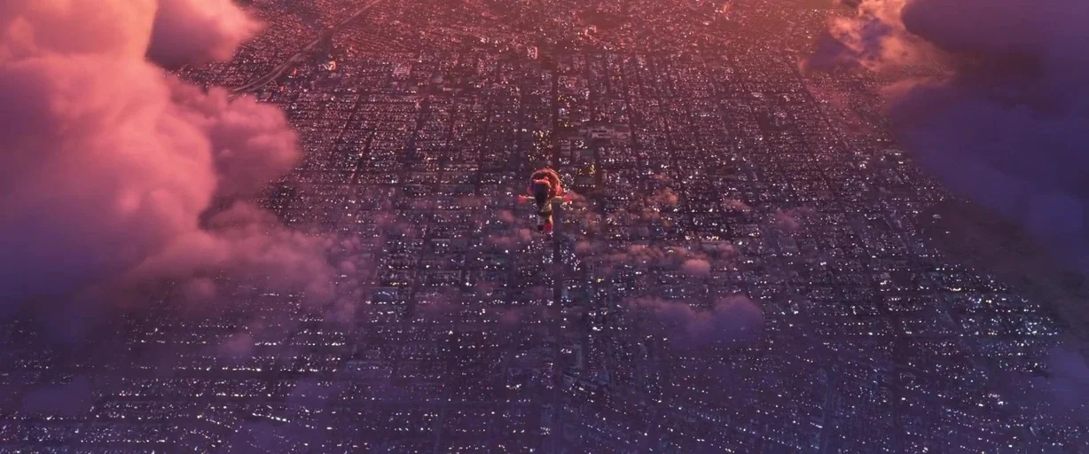 Ralph Breaks the Internet (2018) movie still: establishing — A vast urban grid lies underneath a sky filled with thick purple-tinted clouds. A lone…