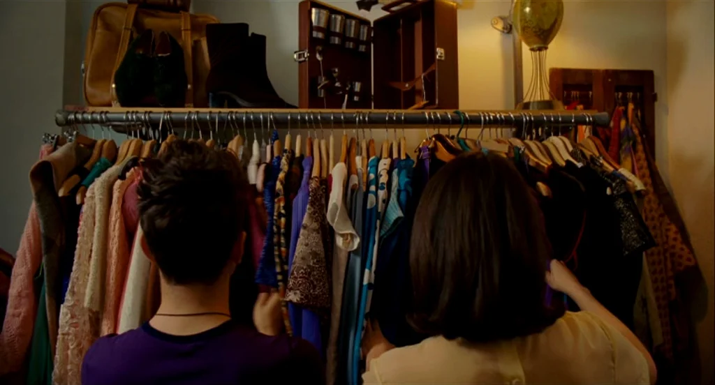 Heartbeats (Les Amours Imaginaires) (2010) movie still: medium — A well-organized indoor closet rack is filled with various garments hanging on…