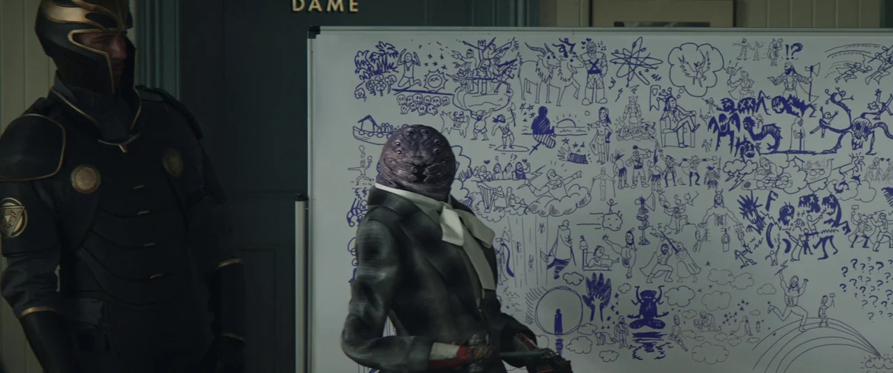 Thor: Love and Thunder (2022) movie still: medium — An interior office space features a large whiteboard covered in dense blue marker sketches. An…