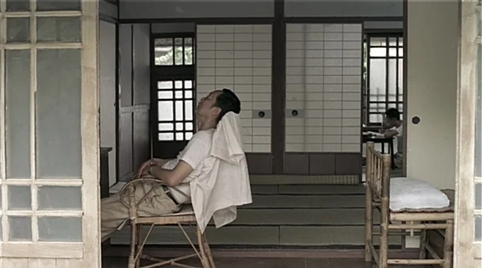 A Time To Love and A Time To Die (1985) movie still: wide — A traditional Japanese room features shoji screens and tatami flooring in a calm…