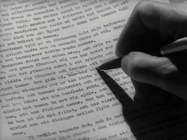 Through A Glass Darkly (1961) movie still: closeup — Close-up view of a hand making corrections on a sheet of typewritten paper. The light source…