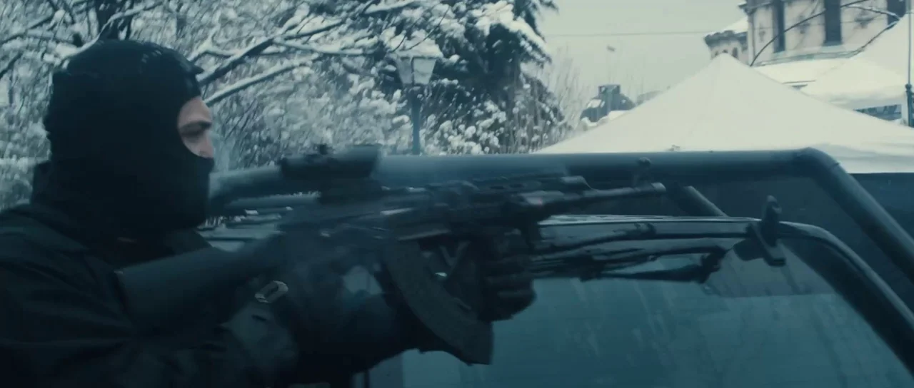 Universal Soldier: Regeneration (2009) movie still: medium — An outdoor snowy environment with a person wearing a black tactical balaclava. The…