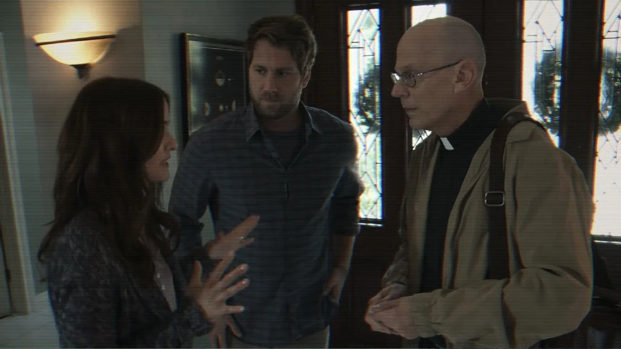 Paranormal Activity: The Ghost Dimension (2015) movie still: medium — A residential foyer features stained glass window panes and a dark wood door…
