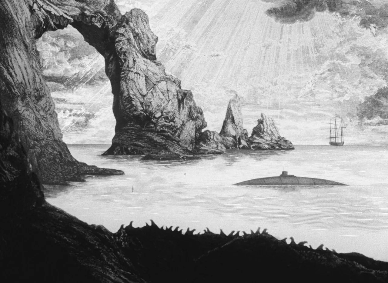 Invention For Destruction (1958) movie still: wide — A rocky, jagged coastline features a large natural stone arch above the water. A vintage-style…