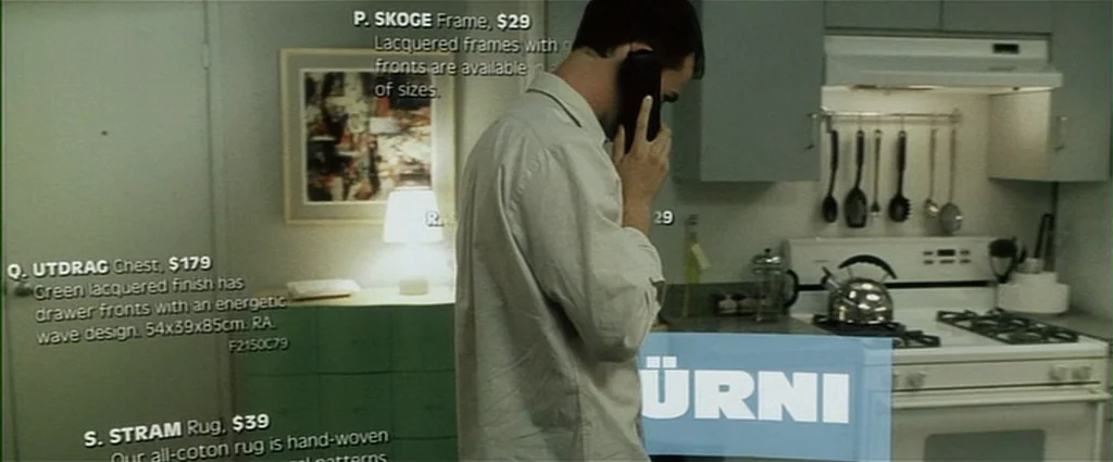 Fight Club (1999) movie still: medium — A man stands in a brightly lit residential space filled with floating furniture advertisements. He holds a…