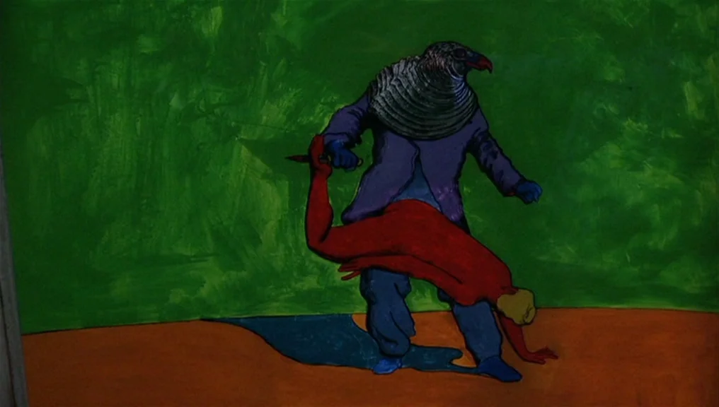 Performance (1970) movie still: fullbody — A flat painted background consists of a bright green wall and orange floor. A stylized bird-headed…