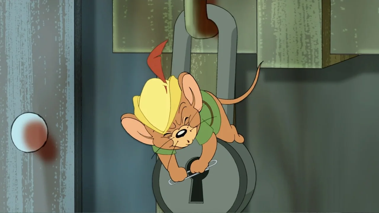 Tom and Jerry: Robin Hood and His Merry Mouse (2012) movie still: closeup — A close-up view shows a large grey padlock mounted on a door surface.…