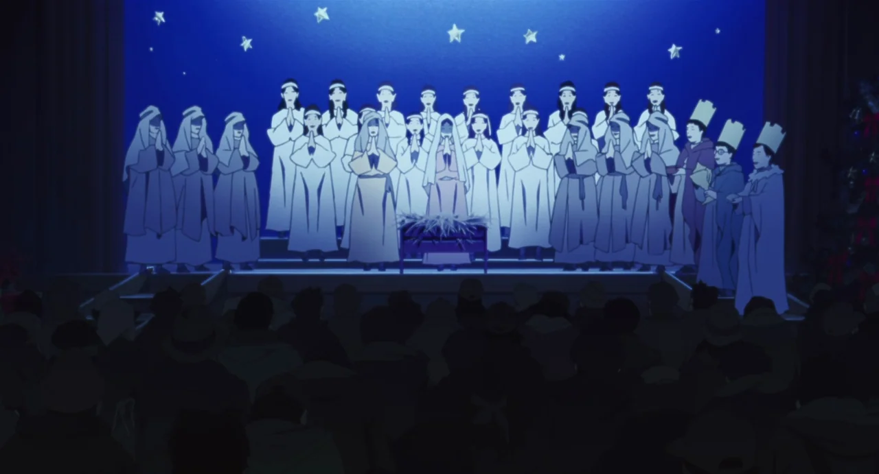 Tokyo Godfathers (2003) movie still: wide — An auditorium stage features a nativity play performance with a blue backdrop and stars. Numerous actors…
