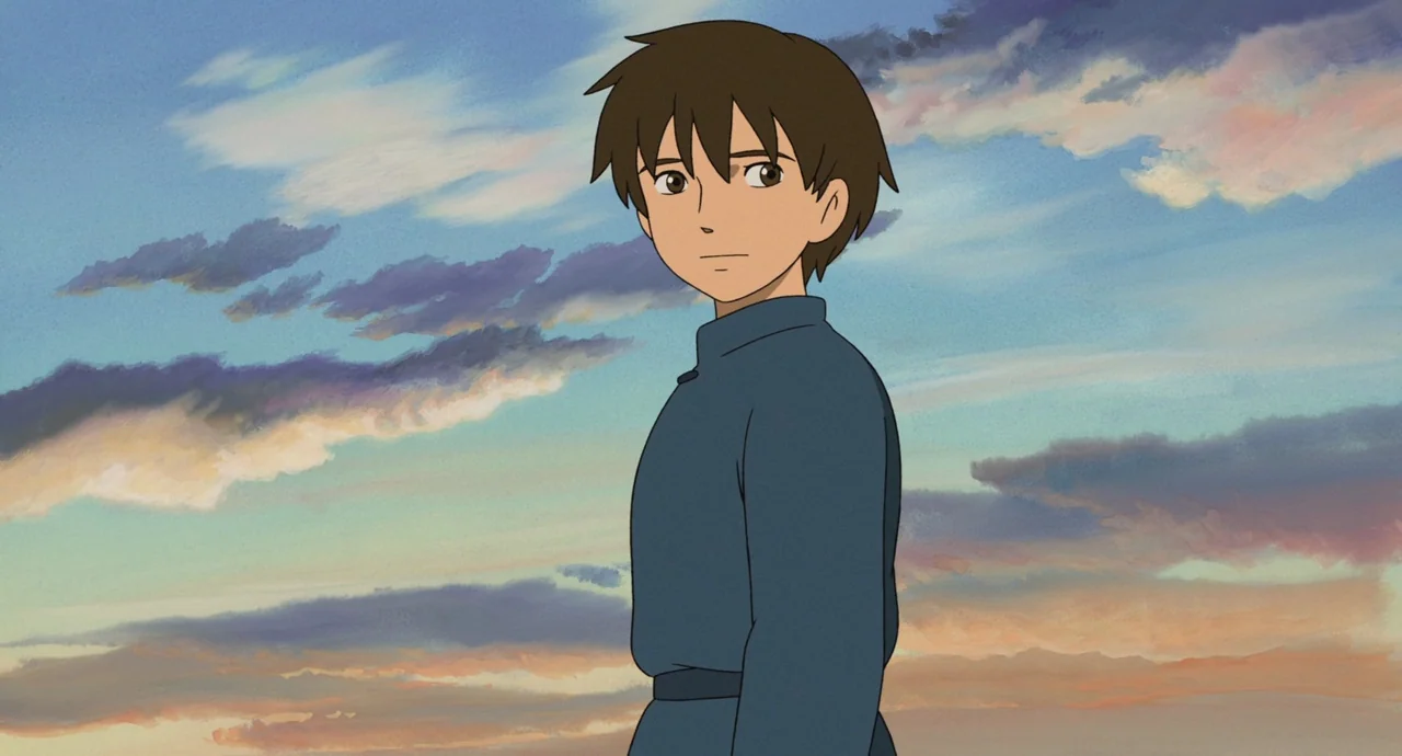 Tales From Earthsea (2006) movie still: medium — A teenage boy stands against a vast, hand-painted sky with wispy, sunset-tinted clouds. He looks…