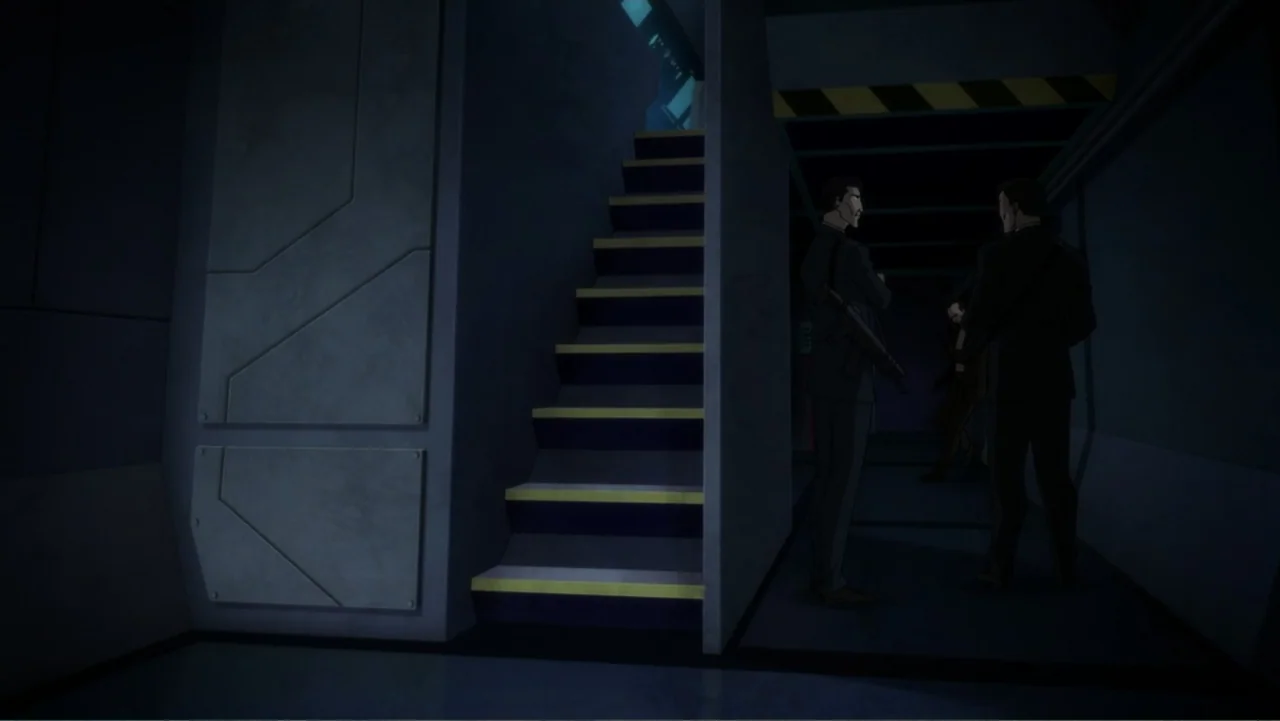 Suicide Squad: Hell to Pay (2018) movie still: medium — A dimly lit interior corridor features a set of stairs with yellow-taped steps. Two men in…