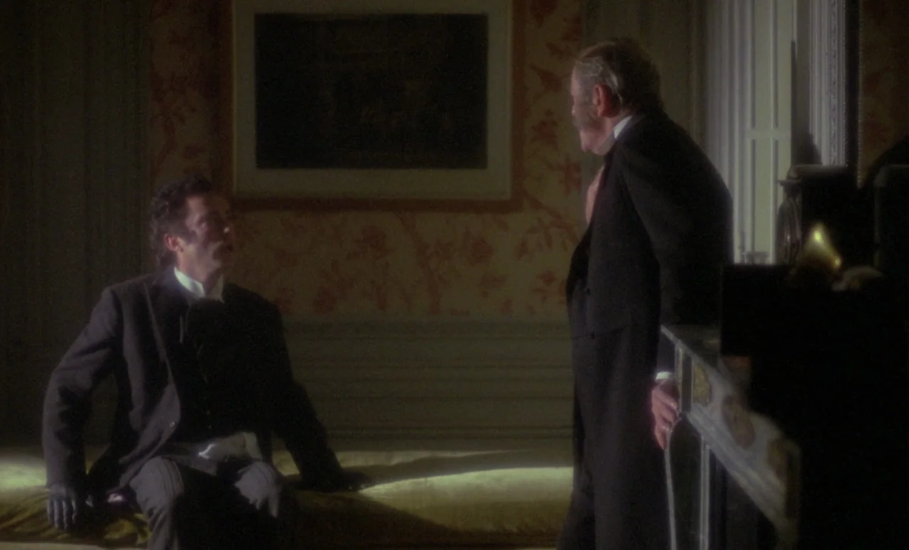 The Strange Case of Dr. Jekyll and Miss Osbourne (1981) movie still: medium — A dimly lit Victorian-era parlor features floral wallpaper and a…
