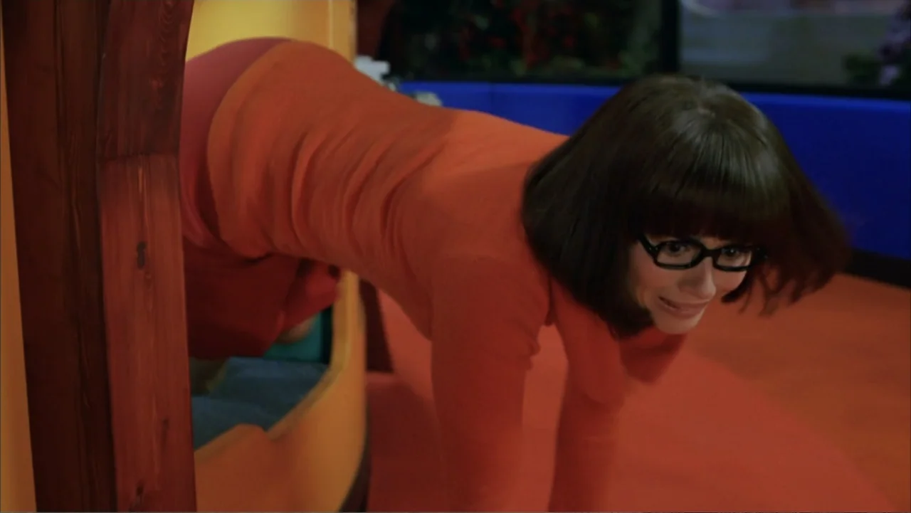 Scooby-Doo 2: Monsters Unleashed (2004) movie still: medium — A vibrant playroom features colorful furniture and a dark wooden doorway frame. A…