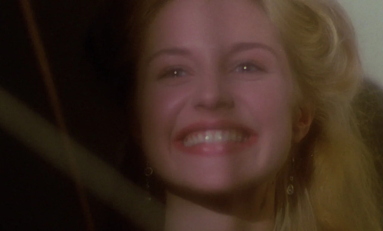 The Strange Case of Dr. Jekyll and Miss Osbourne (1981) movie still: closeup — The face of a blonde woman is shown in close-up against a dark…