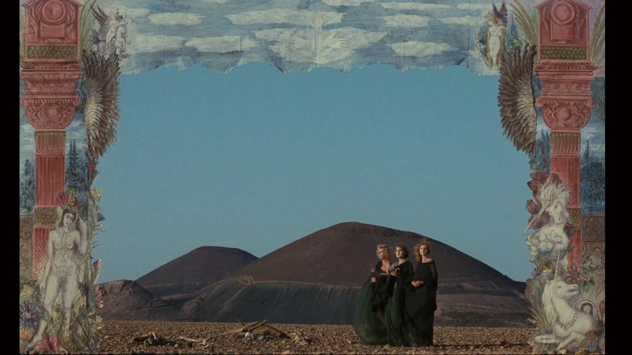 Dorian Gray in the Mirror of the Yellow Press (1984) movie still: wide — A dry, rocky desert landscape features two large, dark volcanic hills under…