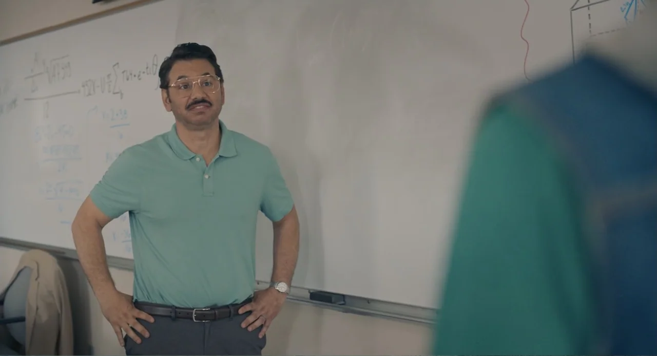 The Map of Tiny Perfect Things (2021) movie still: medium — A brightly lit classroom features a white board covered in handwritten mathematical…