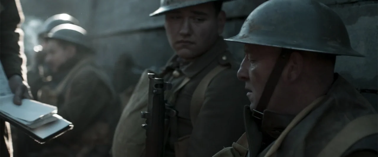 Gone Missing -  Old John's Final Journey (2014) movie still: medium — A narrow mud-walled trench containing several soldiers in World War I era…