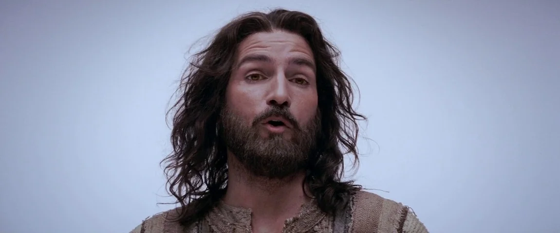The Passion of the Christ (2004) movie still: closeup — An open, featureless, light-grey environment surrounds the subject with no other visible…
